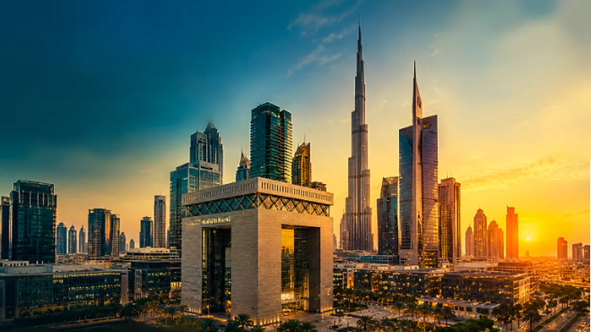 Dubai International Financial Centre and Burj Khalifa at sunset
