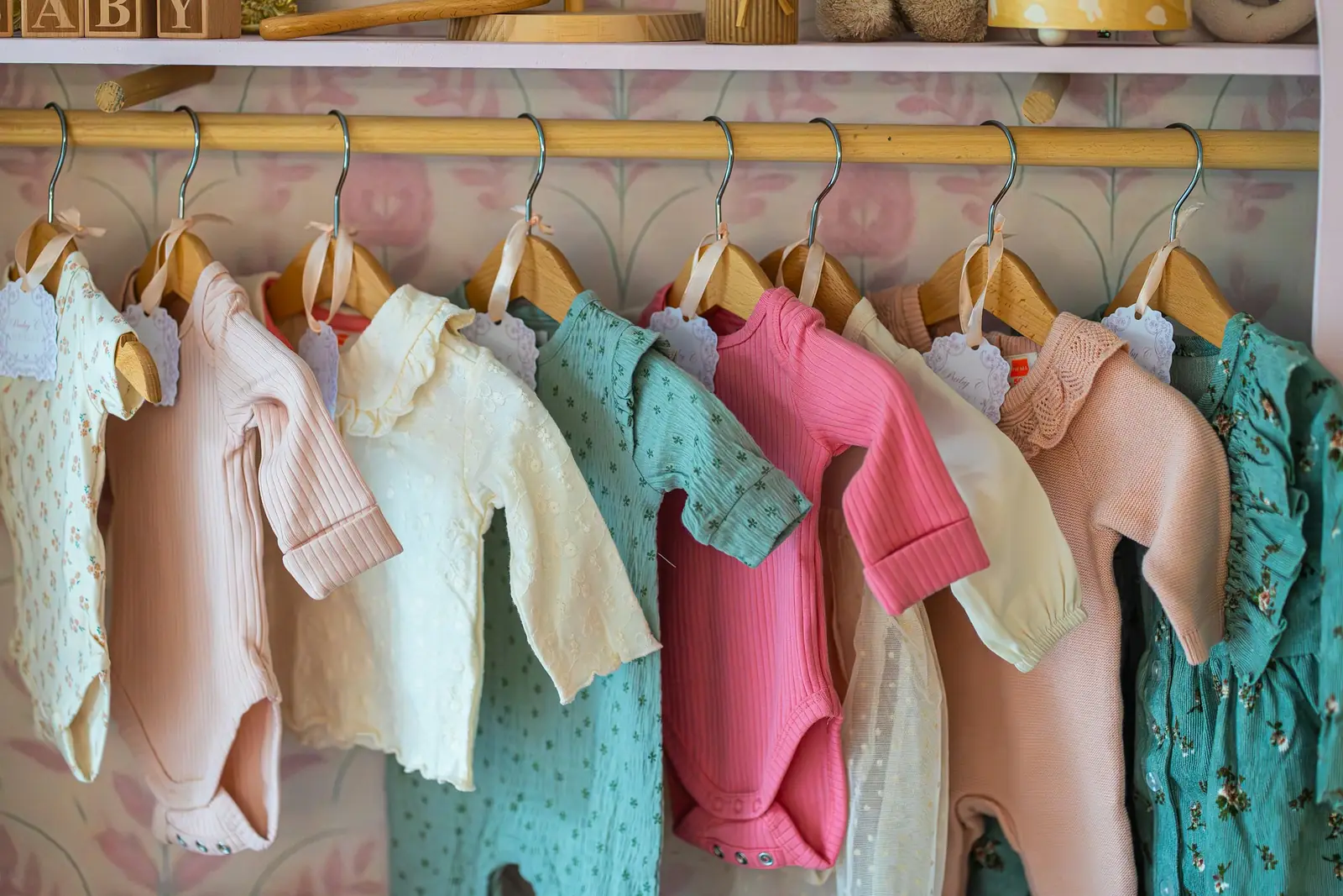 Baby clothes on a rack